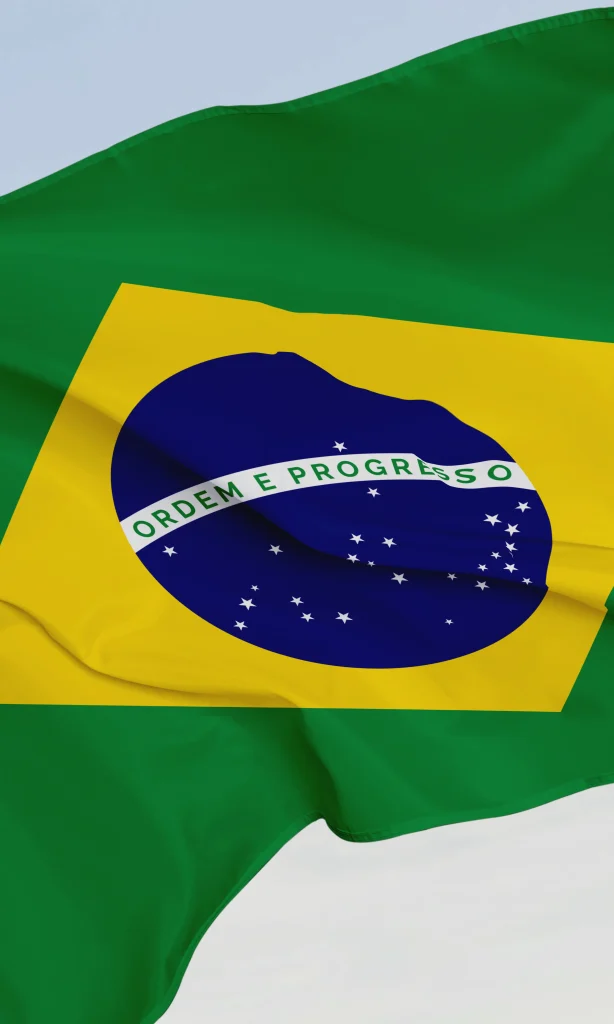 Bandeira do Brasil flutando em um fundo branco. Texto sobre soberania popular.